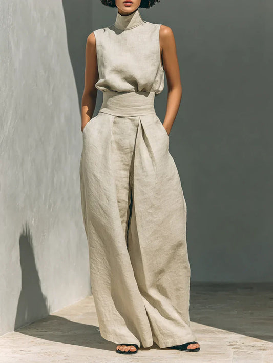 Conjunto compuesto por una blusa sin mangas y pantalones de pierna ancha en una mezcla de algodón y lino.